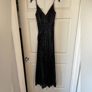 Sequins long black dress.